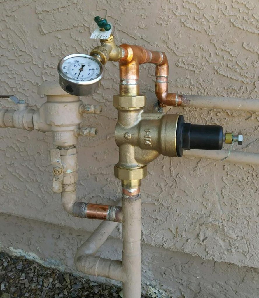 Water pressure regulator on wall